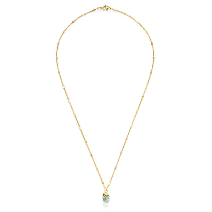 Gold necklace with a green pendant on a white background