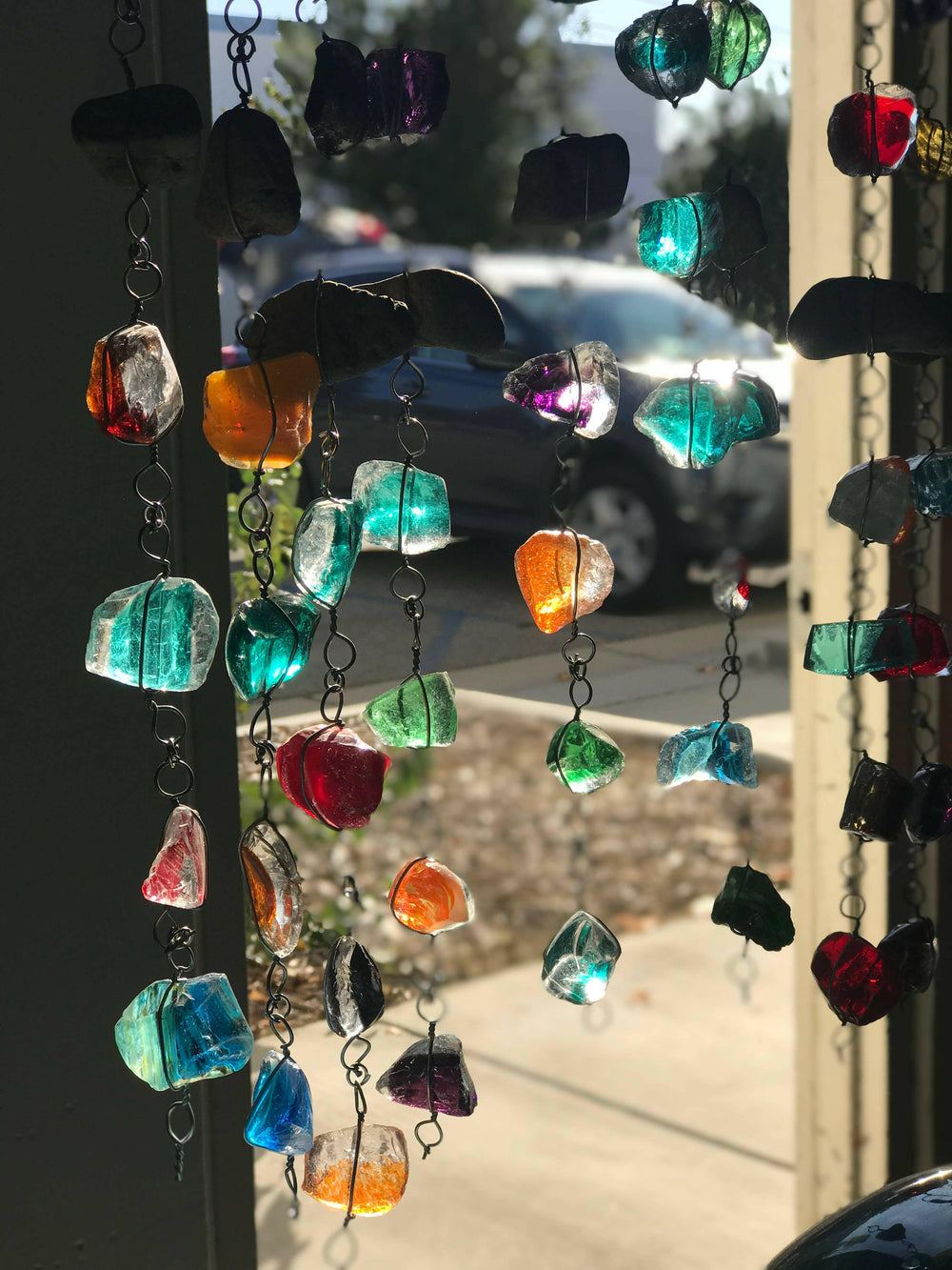 Recycled Art Glass & Rock Rain Chain | Artisans.