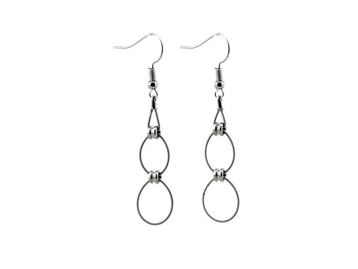 Unique earrings crafted from recycled guitar strings, combining music-inspired design with elegant jewelry craftsmanship.