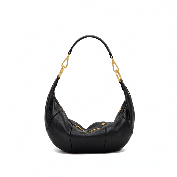 A black pebbled leather crescent-shaped shoulder bag with gold-tone hardware and a curved shoulder strap, shown on a plain white background.