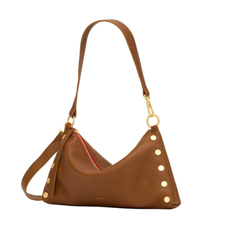 A brown pebbled leather shoulder bag with gold-tone hardware, featuring a triangular silhouette, a zippered main compartment, and decorative gold studs along the side.