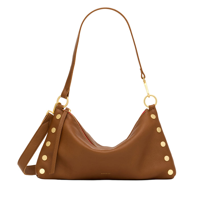 A brown pebbled leather shoulder bag with gold-tone hardware, featuring a crescent-shaped body, a long shoulder strap, and decorative gold studs along the edges, shown against a plain white background.