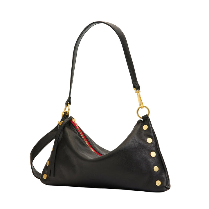 Black handbag with gold accents on a white background