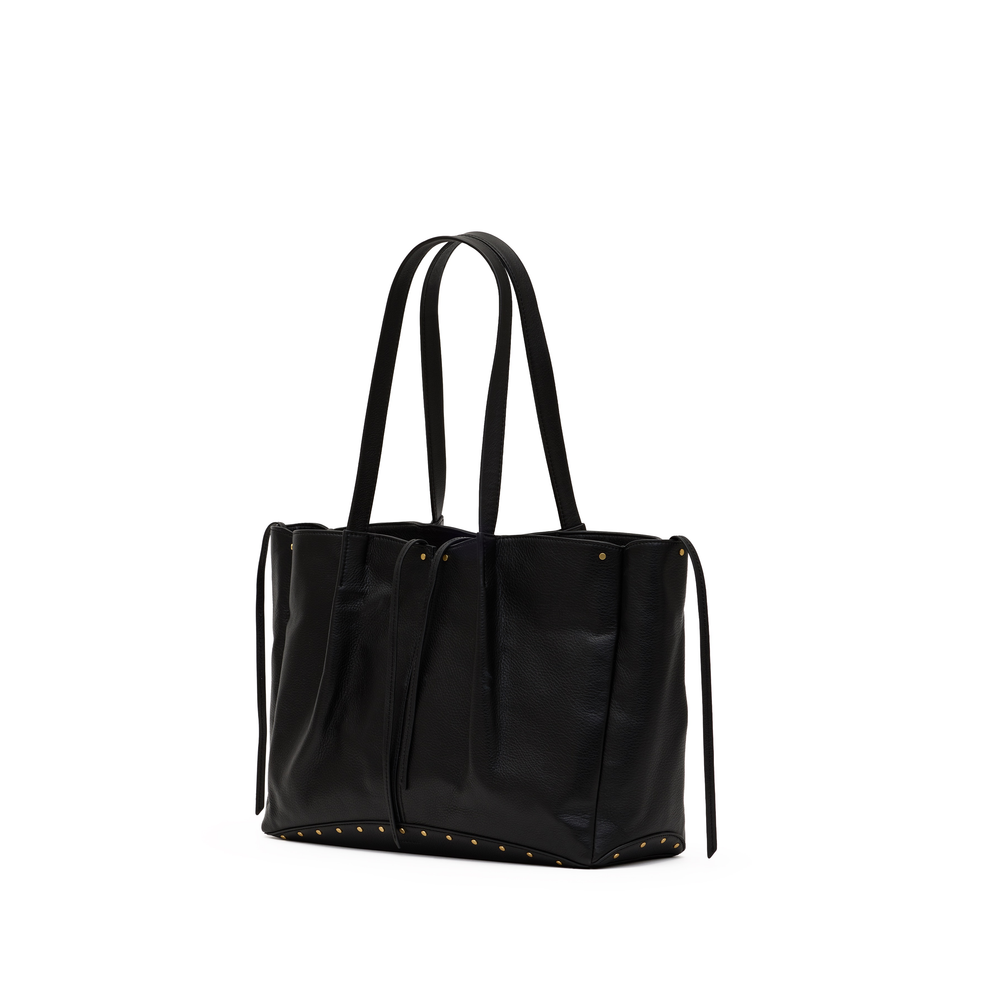A black leather tote bag with double shoulder straps, gold-tone stud detailing along the base, and hanging drawstring ties on the sides, shown against a plain white background.