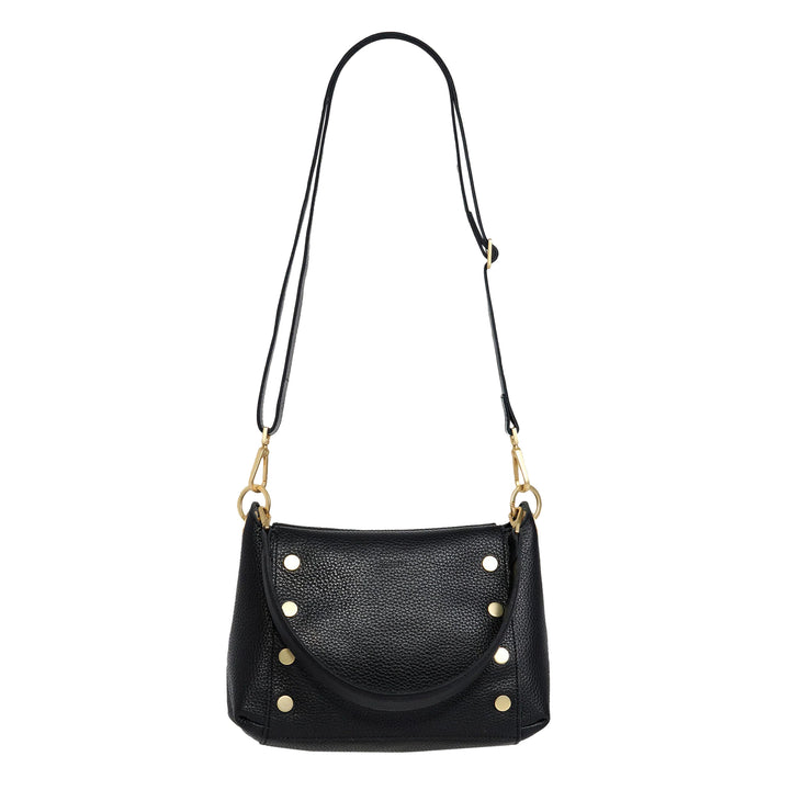 A black pebbled leather shoulder bag with gold-tone hardware, featuring a curved flap front adorned with gold studs and a long black strap, shown against a plain white background.