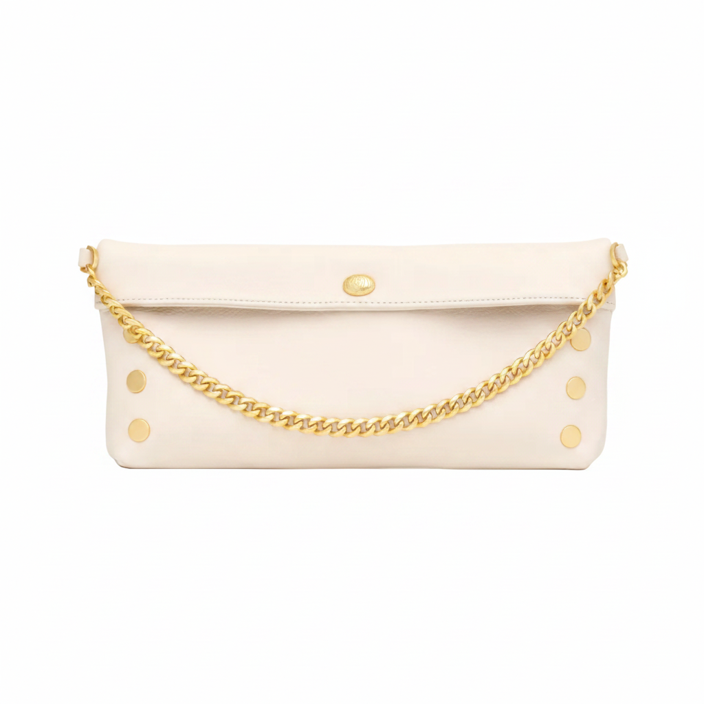 White clutch bag with gold chain strap on a white background