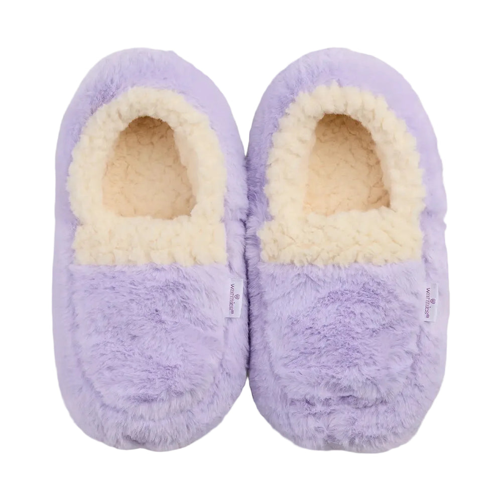 A pair of plush lavender purple slipper slippers with a cream sherpa lining, shown from a top-down view on a light off-white background.