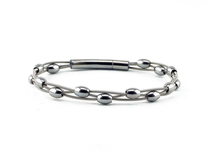Susie Recycled Guitar String Bracelet | Artisans.