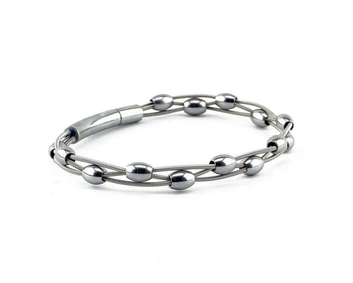 Susie Recycled Guitar String Bracelet | Artisans.
