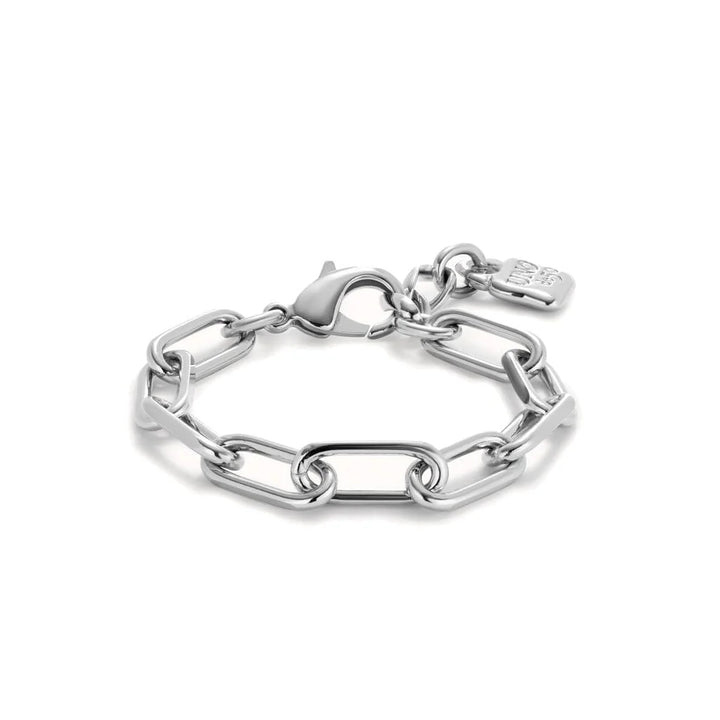 A silver-toned metal chain bracelet with elongated links, a lobster clasp, and a small branded tag, shown on a clean white background.